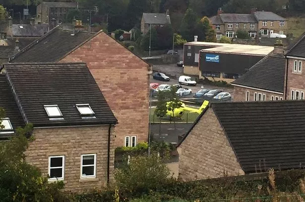 Window cleaner taken to Huddersfield Royal Infirmary after New Mill fall
