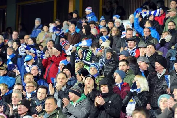 Watch Huddersfield Town supporters show their colours with pride against Wigan Athletic